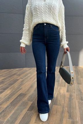 شلوار جین سرمه ای زنانه پاچه اسپانیولی فاق بلند جین ساده کد 825057805