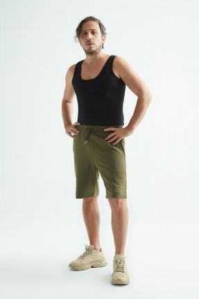 پائین تنه گرمکن ورزشی سبز مردانه رگولار پاچه لوله ای پنبه - پلی استر - الاستن جیب دار کد 149611063