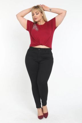 شلوار جین سایز بزرگ مشکی زنانه پاچه تنگ فاق بلند کد 112626179