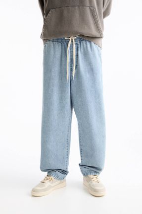 شلوار جین آبی مردانه پاچه کش دار پنبه (نخی) استاندارد کد 834248203