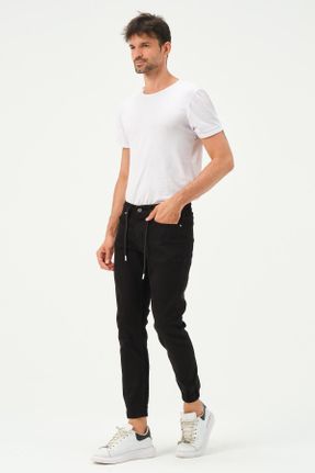 شلوار جین مشکی مردانه پاچه کش دار ساده جوان استاندارد کد 757578004