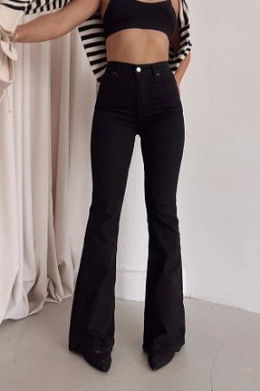 شلوار جین مشکی زنانه پاچه اسپانیولی فاق بلند جین ساده بلند کد 824884479