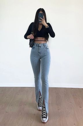 شلوار جین آبی زنانه پاچه اسپانیولی فاق بلند جین ساده کد 824885516