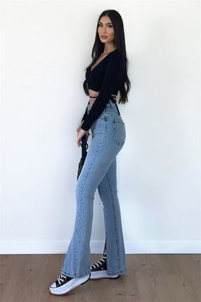 شلوار جین آبی زنانه پاچه اسپانیولی فاق بلند جین ساده کد 824882689