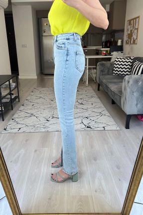 شلوار جین آبی زنانه پاچه اسپانیولی فاق بلند جین ساده کد 824886486