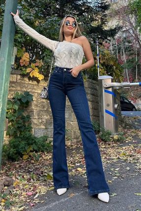 شلوار جین سرمه ای زنانه پاچه اسپانیولی فاق بلند جین ساده بلند کد 824884959