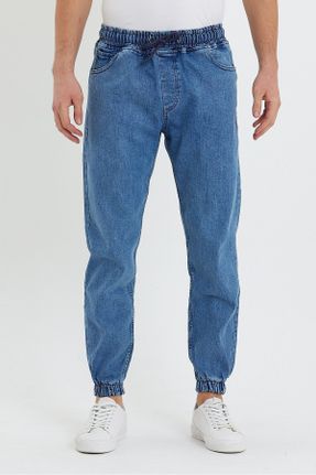 شلوار آبی مردانه جین پاچه کش دار کش دار جاگر کد 383995776