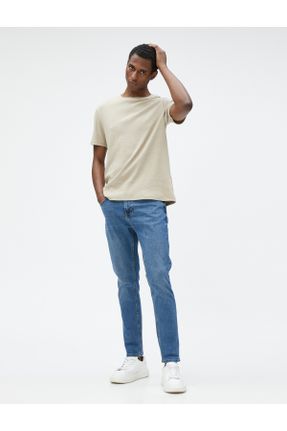 شلوار جین آبی مردانه پاچه تنگ استاندارد کد 691075796