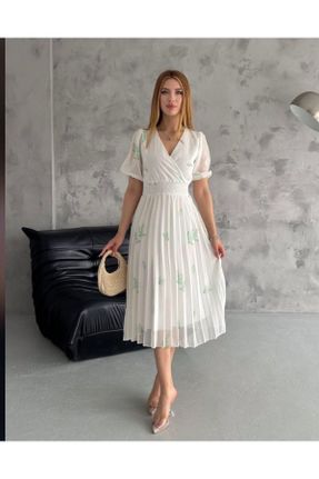 لباس سفید زنانه بافتنی طرح گلدار گلوژ کد 822140621