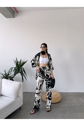ست بالاتنه و پائین تنه مشکی زنانه بافتنی Fav Style - کد 841132098