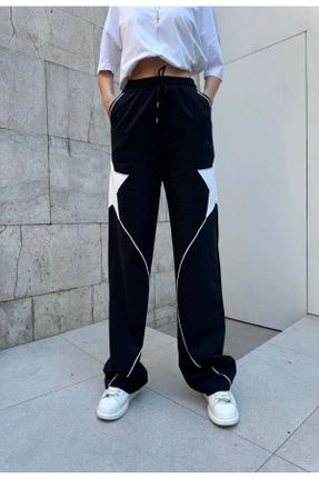 پائین تنه گرمکن ورزشی مشکی زنانه اورسایز پاچه کش دار پنبه (نخی) فاق بلند بدون جیب کد 841109590