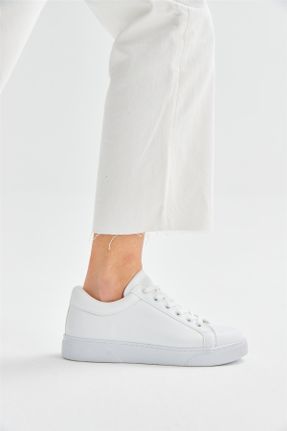 کفش اسنیکر سفید زنانه چرم مصنوعی کد 265576870