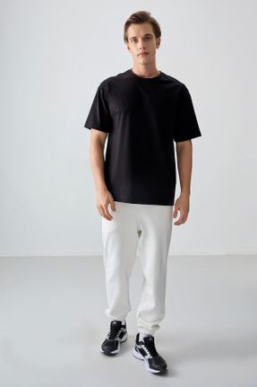 تی شرت مشکی مردانه رگولار یقه گرد پنبه - پلی استر تکی کد 811844157