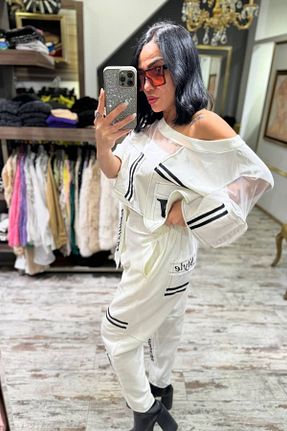 شلوار سفید زنانه پارچه H4 - کد 843116256