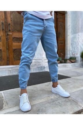 شلوار جین آبی زنانه پاچه کش دار جین ساده جوان بلند کد 732811553