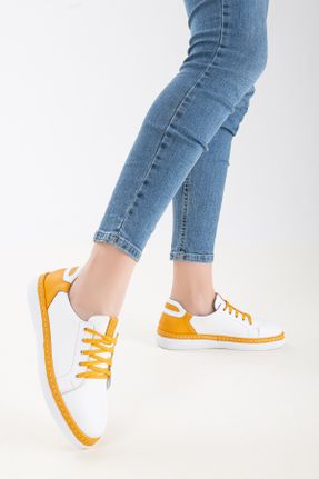 کفش اسنیکر زرد زنانه چرم طبیعی بدون بند چرم طبیعی کد 679441532