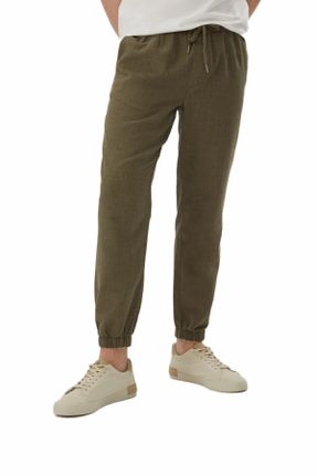 شلوار سبز مردانه جین پاچه تنگ فاق نرمال کارگو کد 811763285