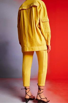 شلوار زرد زنانه پنبه (نخی) بافتنی پاچه لوله ای فاق نرمال مام فیت کد 844134324