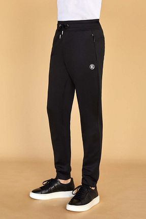 شلوار کرمگن سرمه ای مردانه پاچه کش دار SPORTEMPT - کد 831687799