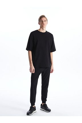 شلوار کرمگن مشکی مردانه رگولار LC Waikiki - کد 852585308