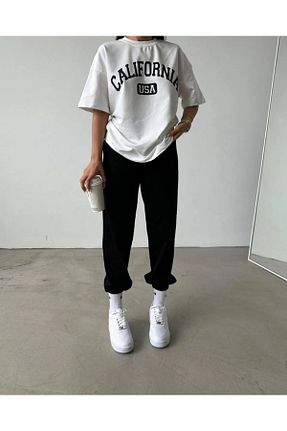 ست بالاتنه و پائین تنه مشکی زنانه بافتنی npLStore - کد 853273286