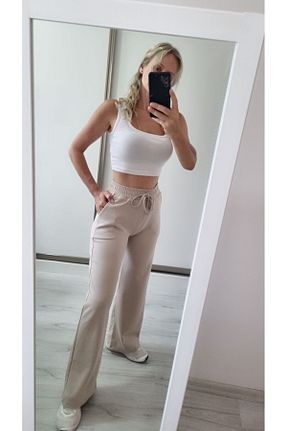 شلوار بژ زنانه پارچه Garamak - کد 857612867