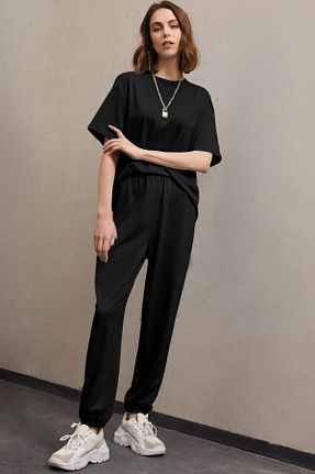 ست بالاتنه و پائین تنه مشکی زنانه بافتنی uyguntarz - کد 660357124