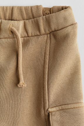 شلوار کرمگن بژ بچه گانه پاچه کش دار H&M - کد 858376085