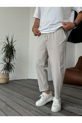 شلوار بژ مردانه پارچه BYBASICMAN - کد 834265596