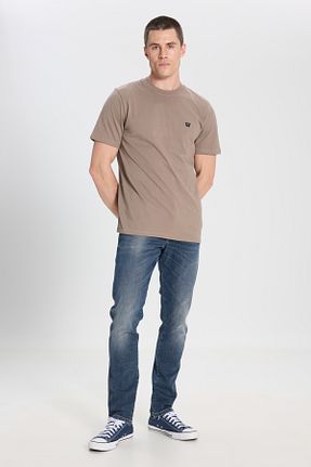 شلوار جین آبی مردانه پاچه تنگ Wrangler - کد 774655428