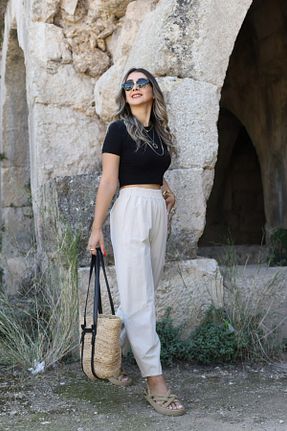 شلوار پارچه ای بژ زنانه فاق بلند bytugcekaya - کد 859284282