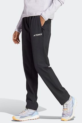 شلوار کرمگن مشکی زنانه پاچه دکمه فشاری adidas - کد 863264246