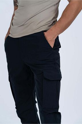 شلوار مشکی مردانه لیکرا COMART - کد 864708692
