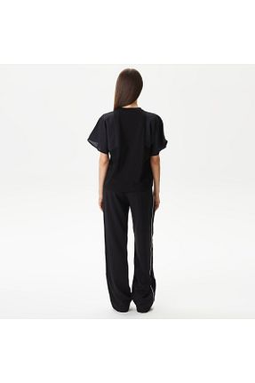 شلوار مشکی زنانه بافتنی Lacoste - کد 834443886
