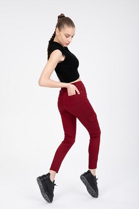 شلوار جین زرشکی زنانه پاچه تنگ SHEVEGA - کد 864238460
