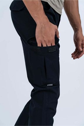 شلوار مشکی مردانه لیکرا COMART - کد 864708692