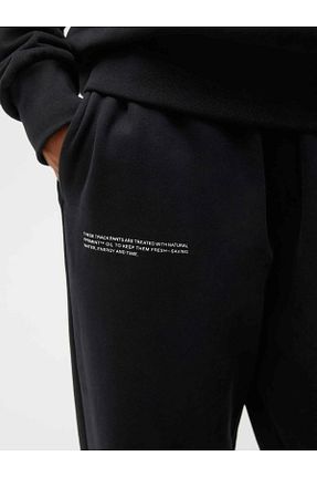 شلوار کرمگن مشکی زنانه اورسایز The Champ Clothing - کد 850828828