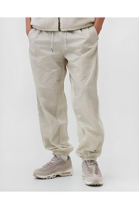 شلوار کرمگن بژ مردانه پاچه کش دار Nike - کد 808534008