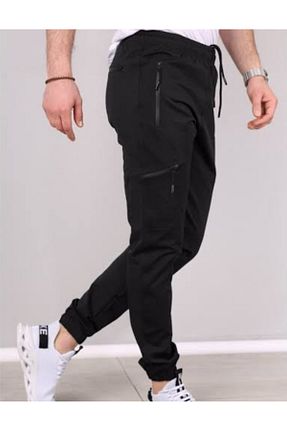 شلوار کرمگن مشکی زنانه پاچه کش دار NASİP - کد 865046487