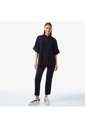 شلوار مشکی زنانه پارچه Lacoste - کد 838637820