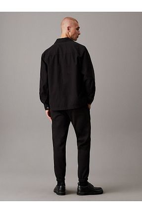 شلوار کرمگن مشکی مردانه رگولار Calvin Klein - کد 862746189