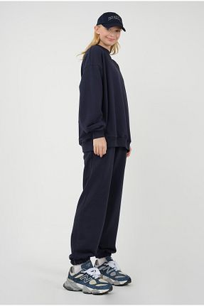 شلوار کرمگن سرمه ای زنانه پاچه کش دار HEQA - کد 796213301
