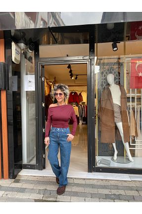 شلوار جین آبی زنانه پاچه گشاد özlem adaşoğlu boutique - کد 879412749