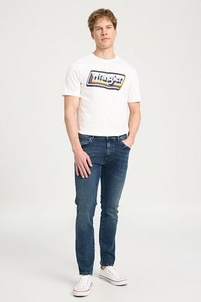 شلوار جین سرمه ای مردانه پاچه تنگ Wrangler - کد 150264006