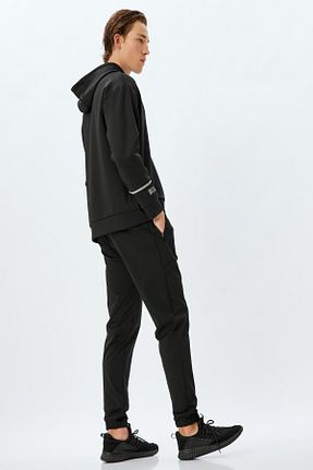 شلوار کرمگن مشکی مردانه پاچه لوله تفنگی Koton - کد 877425051