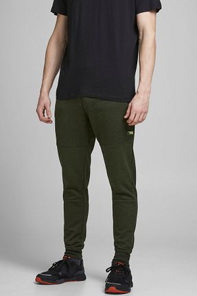 شلوار سبز مردانه پنبه پلی استر Jack & Jones - کد 461681450