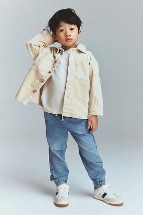 شلوار جین سرمه ای بچه گانه پاچه کش دار H&M - کد 886294624