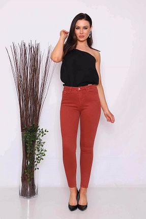 شلوار جین نارنجی زنانه پاچه تنگ Modaca - کد 95309800