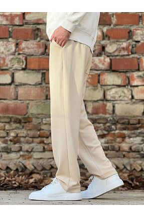 شلوار جین بژ زنانه پاچه کش دار ElitWear - کد 884234544