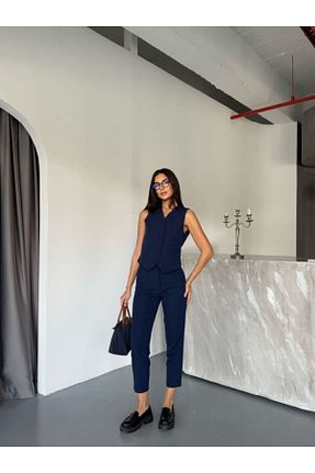 ست بالاتنه و پائین تنه سرمه ای زنانه بافتنی jennyfer garment - کد 888653399